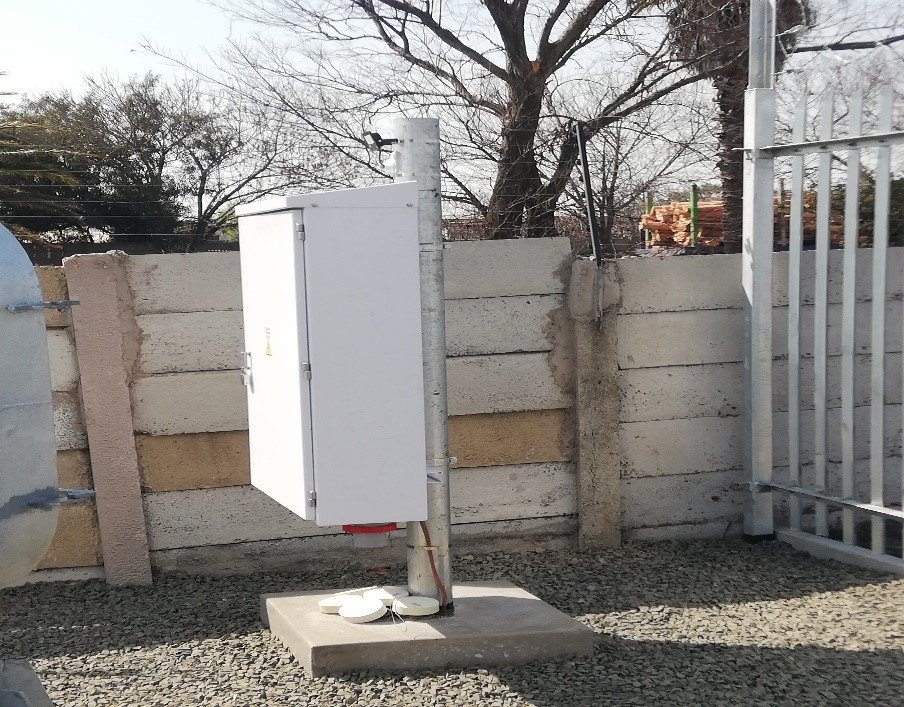 Equipment cabinet on a concrete plinth